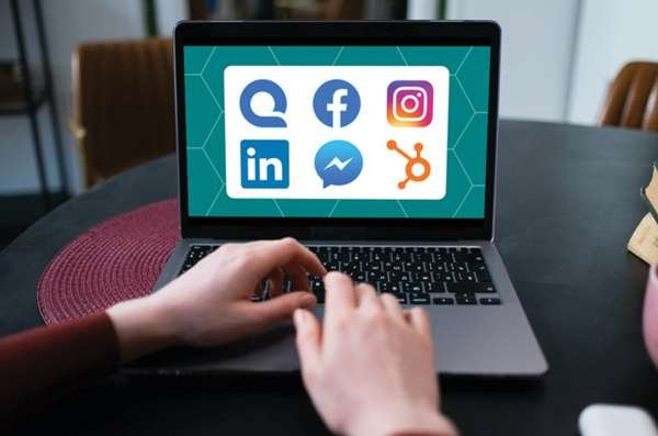 laptop displayed social media icons