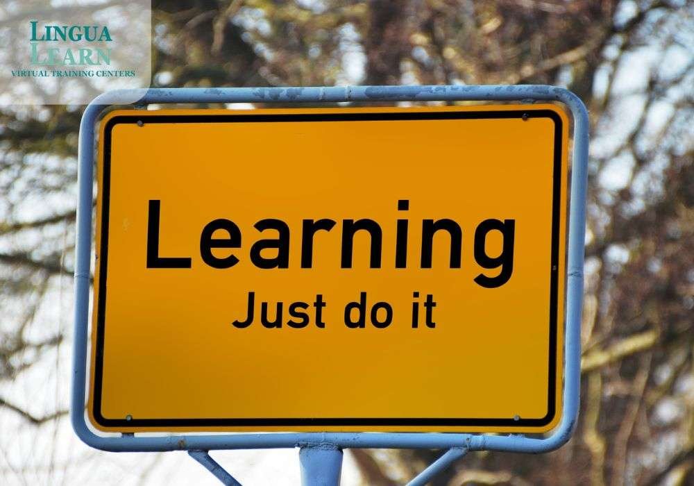 yellow sign that says 'Learning' with the phrase 'Just do it' below